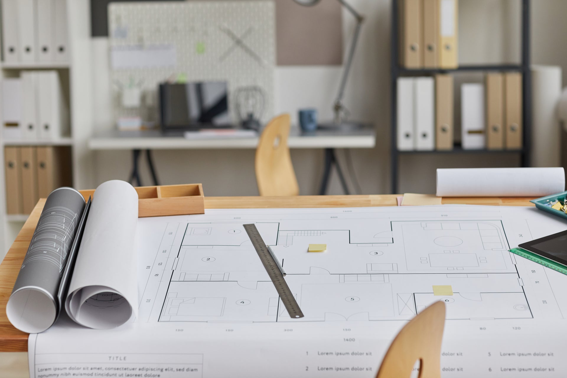 Architectural blueprints on a desk