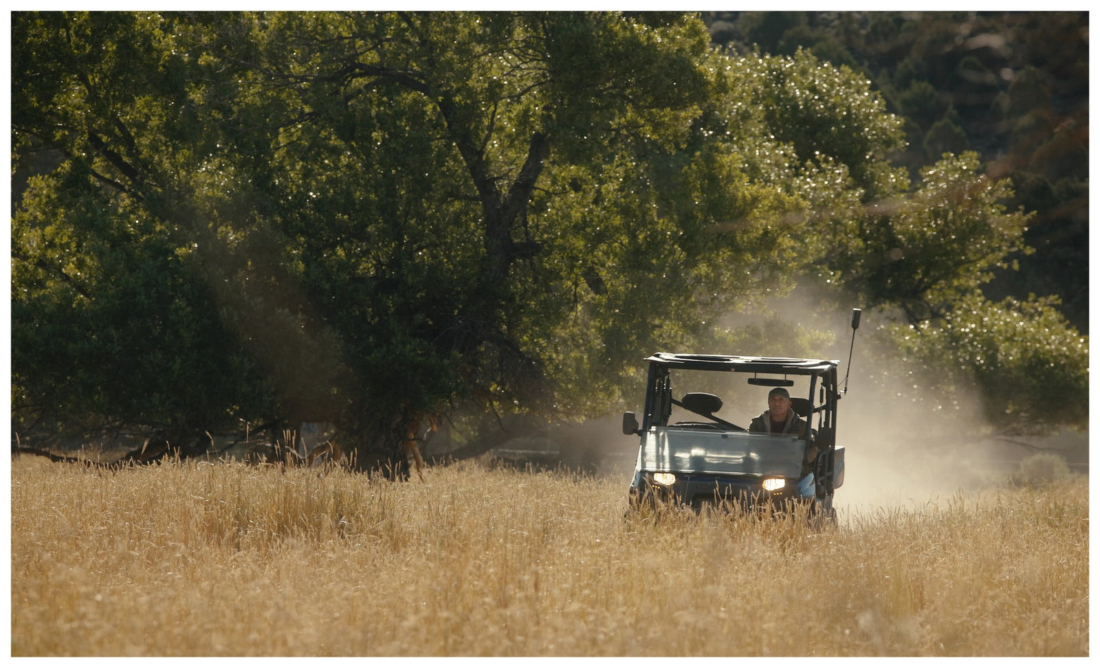 Side by side with the weBoost SxS antenna working a ranch field