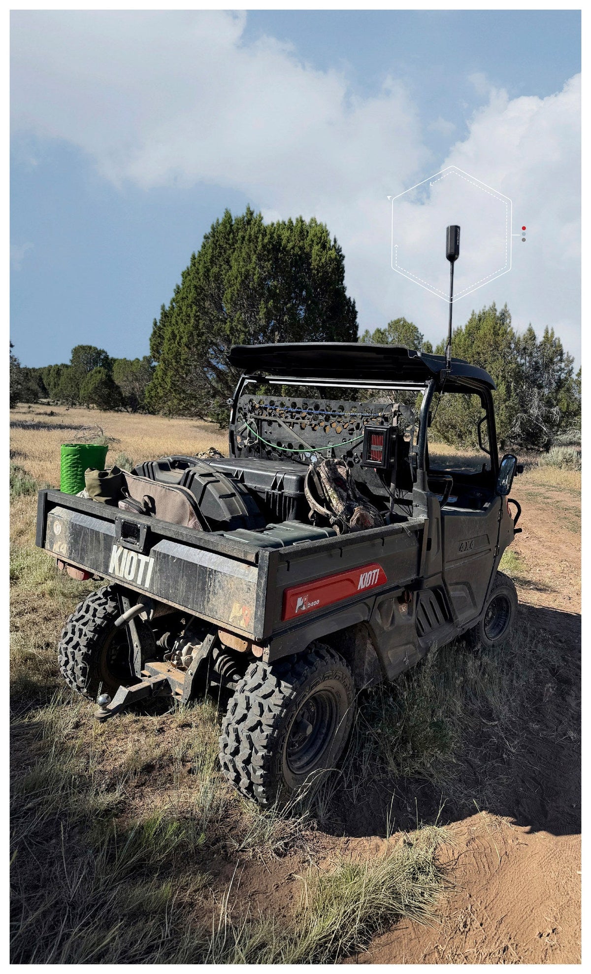 Loaded hunting side by side with the weBoost SxS antenna on the cage