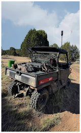 Loaded hunting side by side with the weBoost SxS antenna on the cage