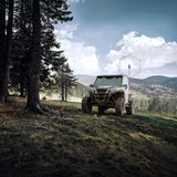weBoost SxS antenna on a side by side roll cage in the forest